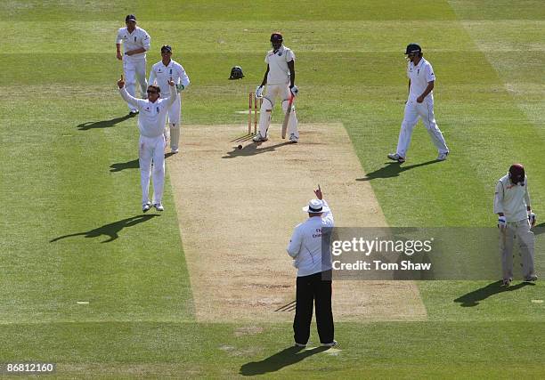 Graeme Swann of England celebrates the wicket of Jerome Taylor of West Indies during day three of the 1st npower Test match between England and West...