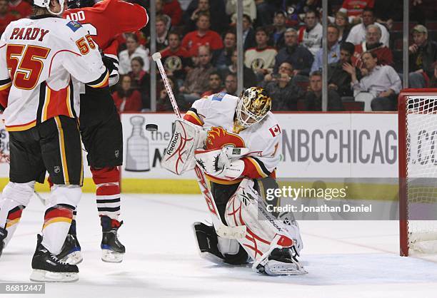 Goaltender Curtis McElhinney of the Calgary Flames makes a save on the Chicago Blackhawks during Game Five of the Western Conference Quarterfinals of...