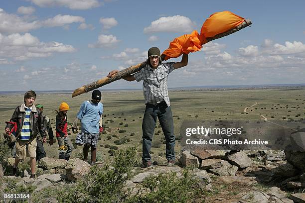 Greg and some other Pioneers hoist a flag on the season finale of KID NATION, Wednesday, Dec. 12 on the CBS Television Network.