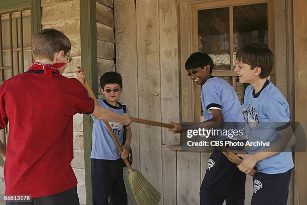 Mike Alex, Anjay and Nathan enjoy a little broom play in KID NATION, the new reality series which will premiere Wednesdays on the CBS Television...