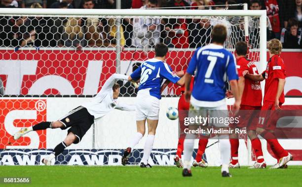 Manuel Friedrich of Leverkusen scores an own goal during the Bundesliga match between Bayer Leverkusen and Arminia Bielefeld at LTU Arena on May 8,...