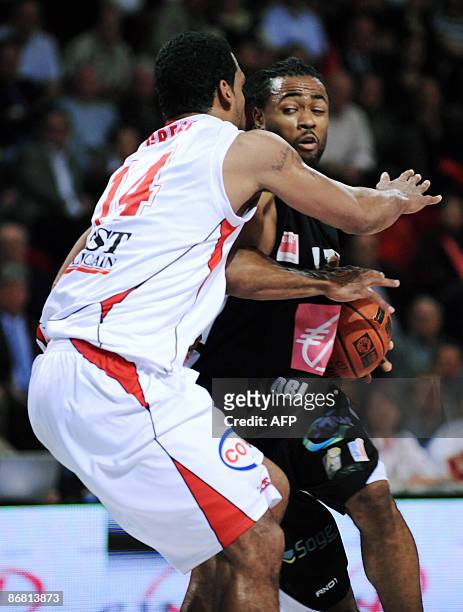 Nancy's Ricardo Greer vies with Orleans's Anthony Dobbins during their French ProA basketball match at the Jean Weille gymnasium in Nancy, eastern...