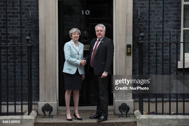 Britain's Prime Minister Theresa May shakes hands with the First Minister of Wales, Carwyn Howell Jones on his arrival at no 10 Downing Street in...