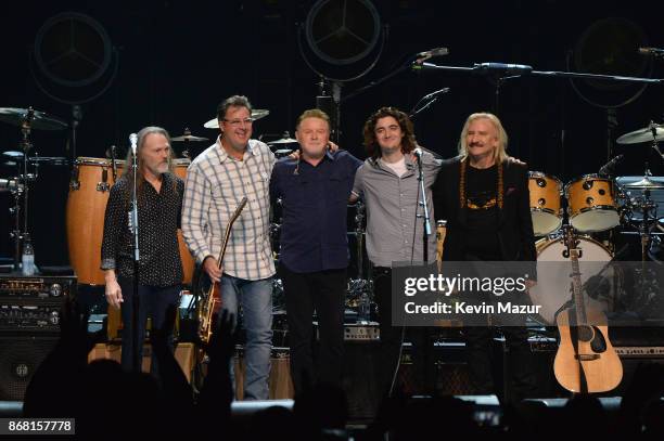 Timothy B. Schmit, Vince Gill, Don Henley, Deacon Frey, and Joe Walsh of the Eagles perform during SiriusXM presents the Eagles in their first ever...