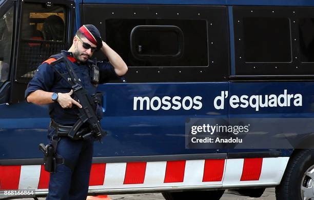 Police forces take security measures in front of the 'Generalitat' palace in Barcelona on October 30, 2017. Spain enters uncharted and potentially...