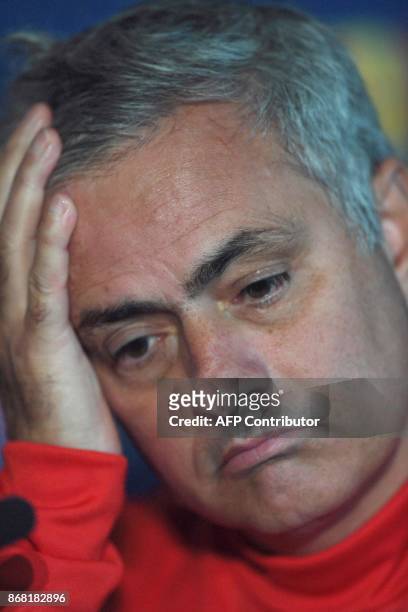 Manchester United's Portuguese manager Jose Mourinho attends a press conference at at Old Trafford in Manchester, north-west England on October 30 on...
