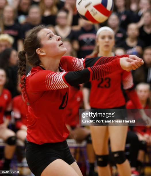 Scarboroughs Ivy DiBiase sets up a team member during the class A volleyball state championship game against South Portland at Deering on Friday,...