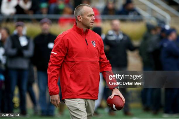 Head coach Dave Doeren of the North Carolina State Wolfpack looks on before the game against the Notre Dame Fighting Irish at Notre Dame Stadium on...