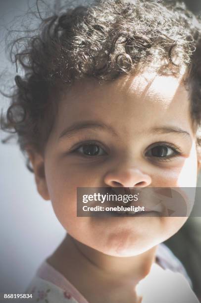 headshot of smiling toddler - onebluelight stock pictures, royalty-free photos & images