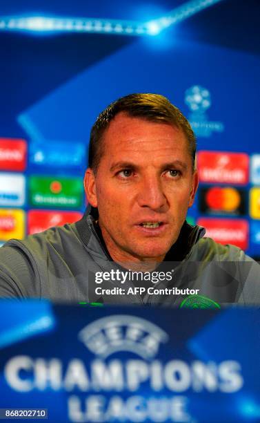 Celtic's head coach Brendan Rodgers attends a press conference at Celtic Park in Glasgow on October 30 on the eve of the UEFA Champions League Group...