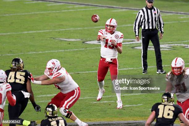 Nebraska Cornhuskers quarterback Tanner Lee passes the ball during the Big Ten conference game between the Purdue Boilermakers and the Nebraska...
