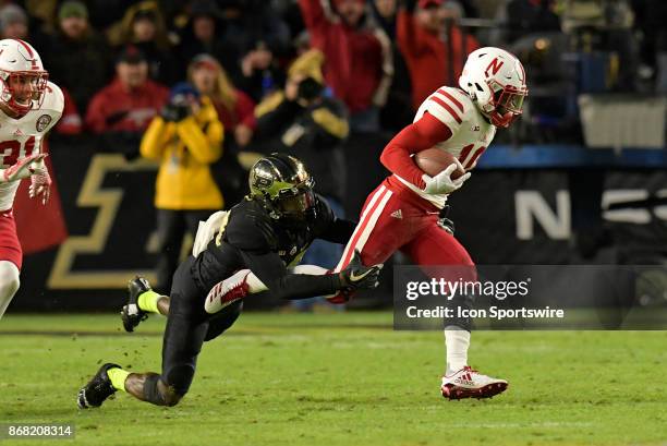 Nebraska Cornhuskers wide receiver JD Spielman is brought down by Purdue Boilermakers cornerback Jacob Abrams during the Big Ten conference game...