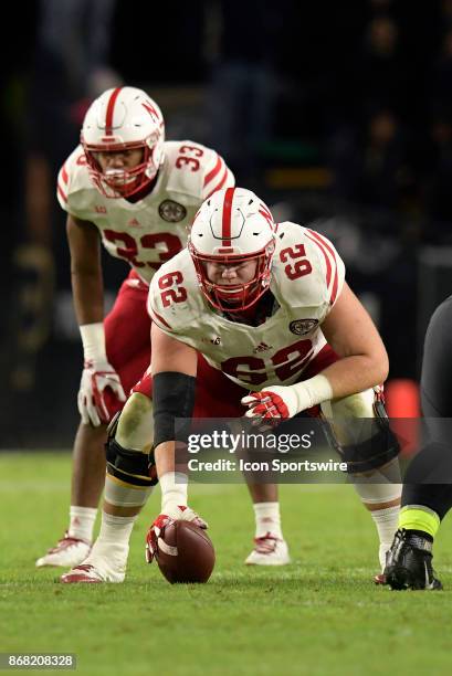 Nebraska Cornhuskers offensive tackle Cole Conrad snaps the ball during the Big Ten conference game between the Purdue Boilermakers and the Nebraska...