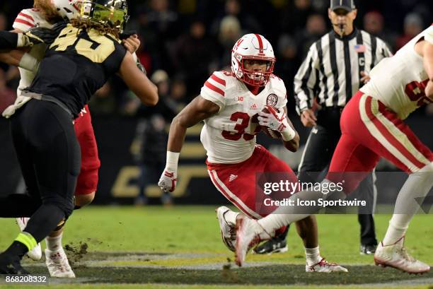 Nebraska Cornhuskers running back Jaylin Bradley finds a seam in the Purdue Boilermakers defense during the Big Ten conference game between the...