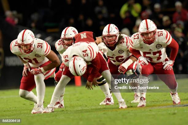 The offensive line for the Nebraska Cornhuskers special teams prepares to block on a punt play during the Big Ten conference game between the Purdue...