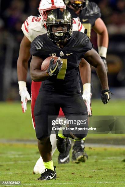 Purdue Boilermakers running back D.J. Knox heads up the field during the Big Ten conference game between the Purdue Boilermakers and the Nebraska...