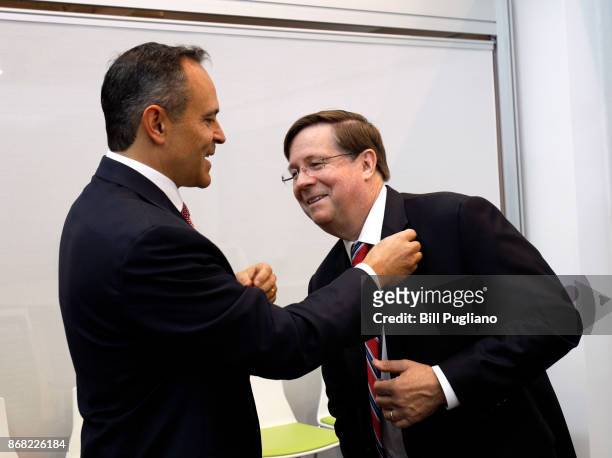 Toyota CEO Jim Lentz and Kentucky Governor Matt Bevin wait to speak at the unveiling of a new Toyota engineering headquarters October 30, 2017 in...