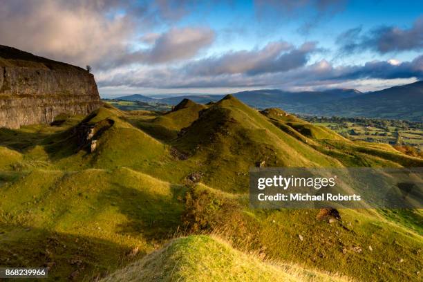 the abandoned limestone quarry of the llangattock escarpment in the black mountains near crickhowell, in the brecon beacons national park, wales - escarpment stock pictures, royalty-free photos & images