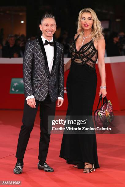 Valeria Marini and Gianluca Mech walk a red carpet for 'Good Food' during the 12th Rome Film Fest at Auditorium Parco Della Musica on October 30,...