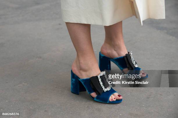 Fashion stylist and consultant Kate Foley Osterweis wears Miu Miu shoes day 3 of Paris Womens Fashion Week Spring/Summer 2018, on September 28, 2017...