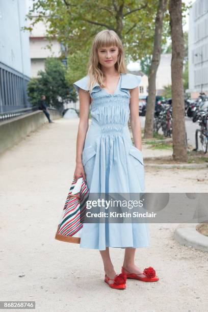 Danish actress Klara Kristin wears a Carven dress, bag and shoes day 3 of Paris Womens Fashion Week Spring/Summer 2018, on September 28, 2017 in...