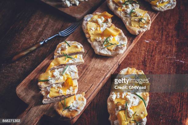 homemade crispbread with ricotta cheese and pumpkins - knäckebrot stock pictures, royalty-free photos & images
