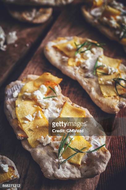 homemade crispbread with ricotta cheese and pumpkins - knäckebrot stock pictures, royalty-free photos & images
