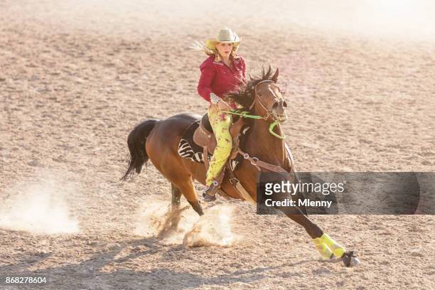 barrel racing competition cowgirl speeding - barrel race stock pictures, royalty-free photos & images