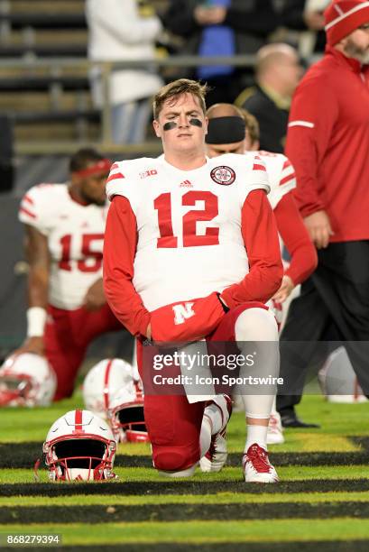 Nebraska Cornhuskers quarterback Patrick O'Brien stretches during warm ups for the Big Ten conference game between the Purdue Boilermakers and the...