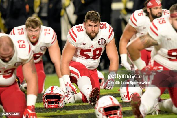 Nebraska Cornhuskers defensive lineman Joel Lopez stretches before the start of the Big Ten conference game between the Purdue Boilermakers and the...