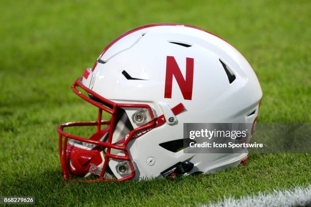 Nebraska Cornhuskers helmet sits on the field before the start of the Big Ten conference game between the Purdue Boilermakers and the Nebraska...