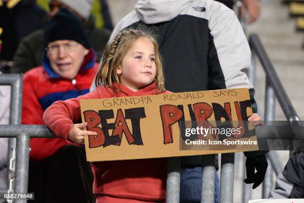 Nebraska Cornhuskers fan holds a sign saying "Beat Purdue" during the Big Ten conference game between the Purdue Boilermakers and the Nebraska...