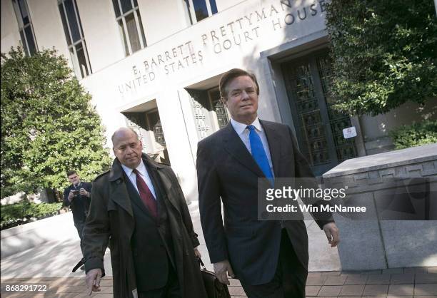 Former campaign manager for U.S. President Donald Trump, Paul Manafort , leaves U.S. District Court after pleading not guilty following his...