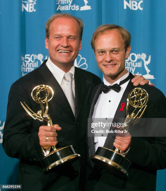 Kelsey Grammer and David Hyde Pierce backstage at the 50th Annual Emmy Awards, on September 13, 1998 in Los Angeles, California.