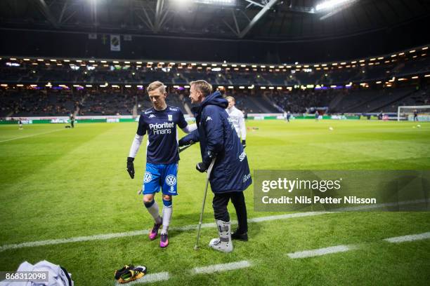Torbjorn Nilsson, assistant coach of IFK Goteborg on crutches and Soren Rieks of IFK Goteborg ahead of the Allsvenskan match between AIK and IFK...