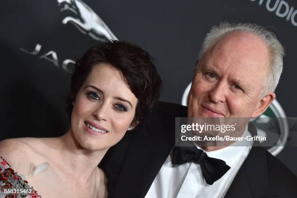 Actors Claire Foy and John Lithgow arrive at the 2017 AMD British Academy Britannia Awards at The Beverly Hilton Hotel on October 27, 2017 in Beverly...