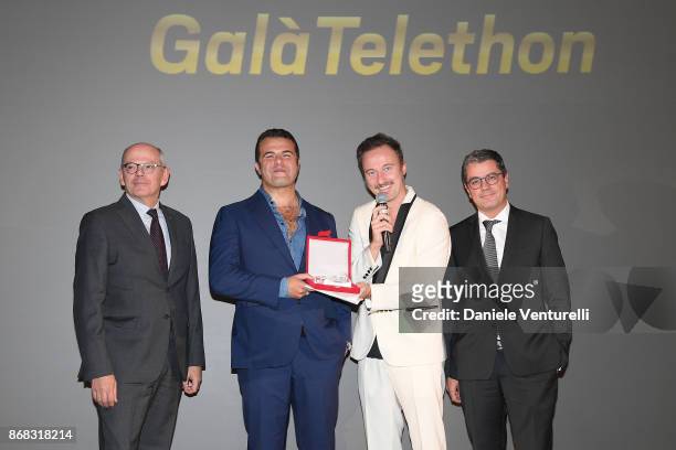 Carlo Brancaleoni, Edoardo De Angelis, Francesco Fachinetti and guests attend Telethon Gala during the 12th Rome Film Fest at Villa Miani on October...