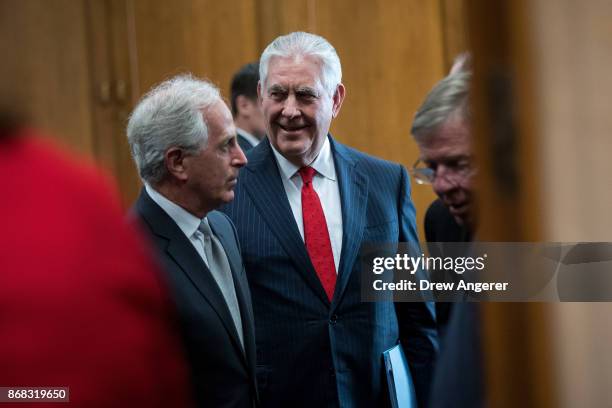 Committee chairman Sen. Bob Corker talks with U.S. Secretary of State Rex Tillerson in a holding room before the start of a Senate Foreign Relations...