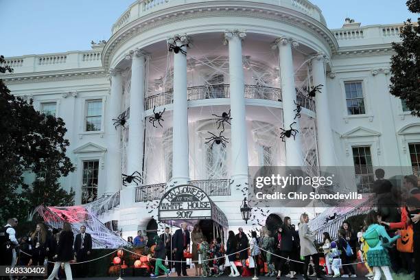 President Donald Trump and first lady Melania Trump host Halloween at the White House on the South Lawn October 30, 2017 in Washington, DC. The first...