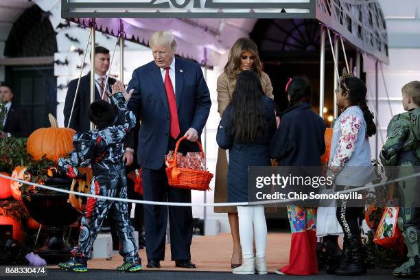 President Donald Trump and first lady Melania Trump host Halloween at the White House on the South Lawn October 30, 2017 in Washington, DC. The first...