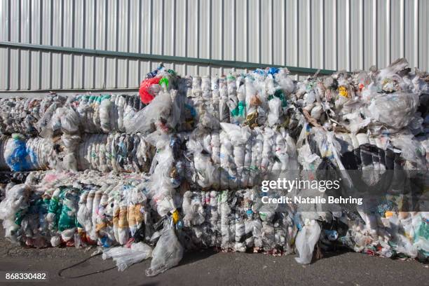 Compressed blocks of plastic waste, which will no longer be accepted for recycling by China at seen at Far West Recycling October 30, 2017 in...