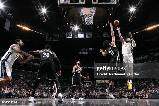 Paul Millsap of the Denver Nuggets shoots the ball against the Brooklyn Nets on October 29, 2017 at Barclays Center in Brooklyn, New York. NOTE TO...