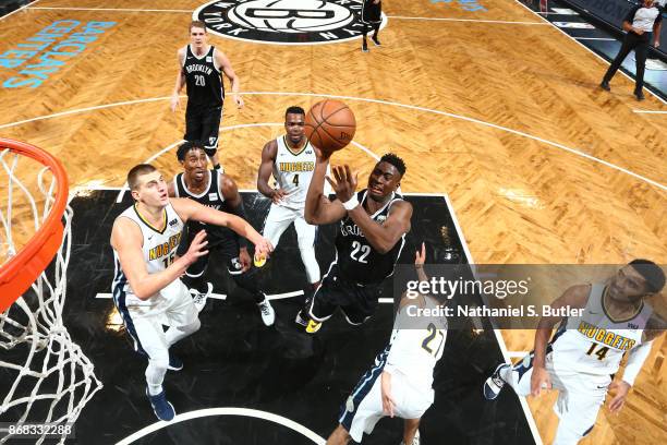 Caris LeVert of the Brooklyn Nets goes to the basket against the Denver Nuggets on October 29, 2017 at Barclays Center in Brooklyn, New York. NOTE TO...