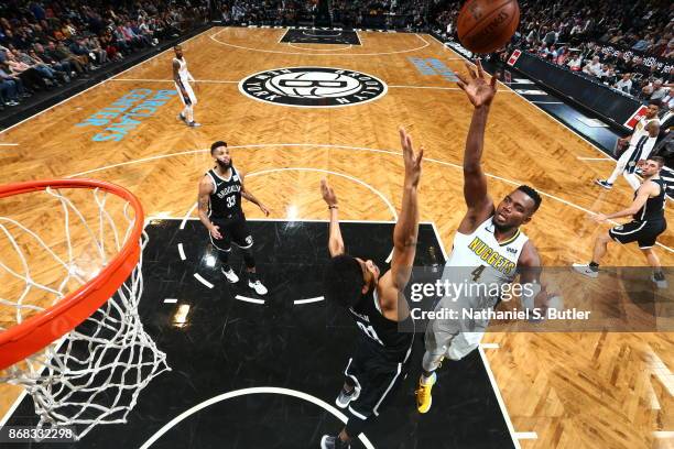 Paul Millsap of the Denver Nuggets shoots the ball against the Brooklyn Nets on October 29, 2017 at Barclays Center in Brooklyn, New York. NOTE TO...