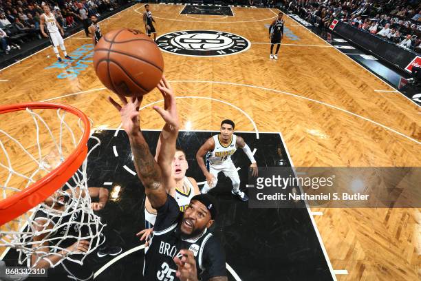 Trevor Booker of the Brooklyn Nets shoots the ball against the Denver Nuggets on October 29, 2017 at Barclays Center in Brooklyn, New York. NOTE TO...