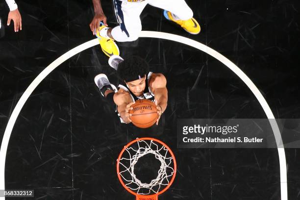 Jarrett Allen of the Brooklyn Nets goes up for a dunk against the Denver Nuggets on October 29, 2017 at Barclays Center in Brooklyn, New York. NOTE...