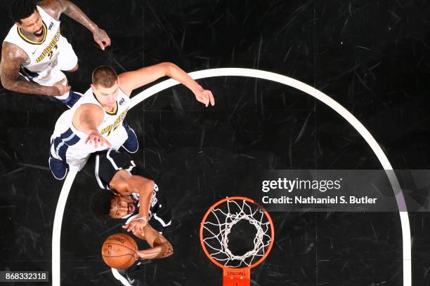 Spencer Dinwiddie of the Brooklyn Nets goes to the basket against the Denver Nuggets on October 29, 2017 at Barclays Center in Brooklyn, New York....