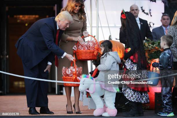 President Donald Trump and first lady Melania Trump host Halloween at the White House on the South Lawn October 30, 2017 in Washington, DC. The first...
