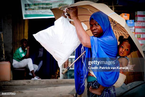 Local people on the street on October 30, 2017 in Lagos, Nigeria.