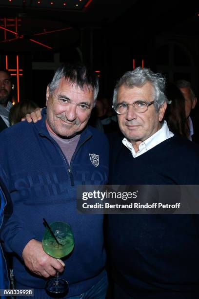 Jean-Marie Bigard and Michel Boujenah attend Claude Lelouch celebrates his 80th Birthday at Restaurant Victoria on October 30, 2017 in Paris, France.